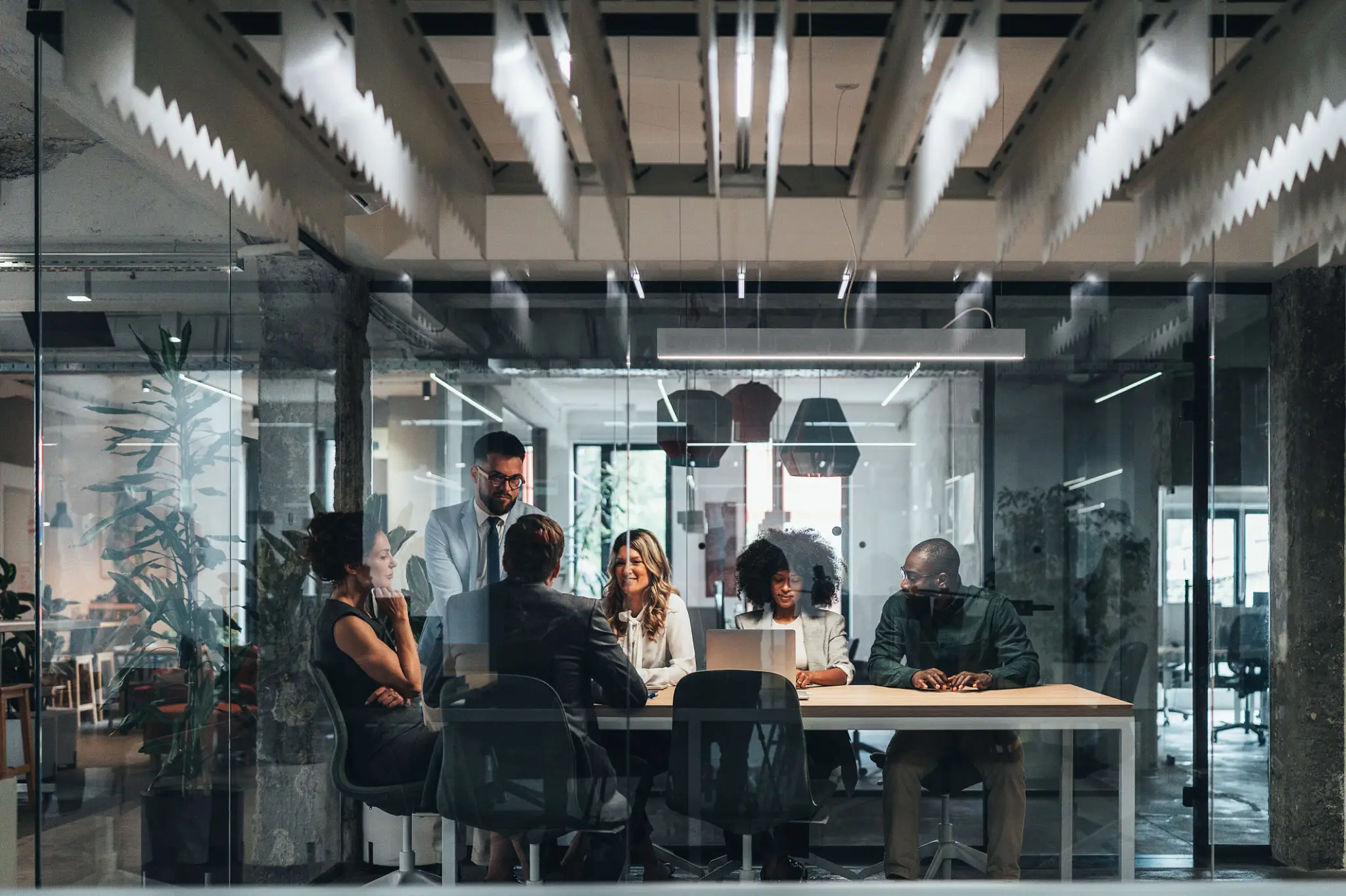 Group discussion in modern office environment.